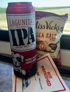 Adult beverage and snack in Amtrak Cafe Car